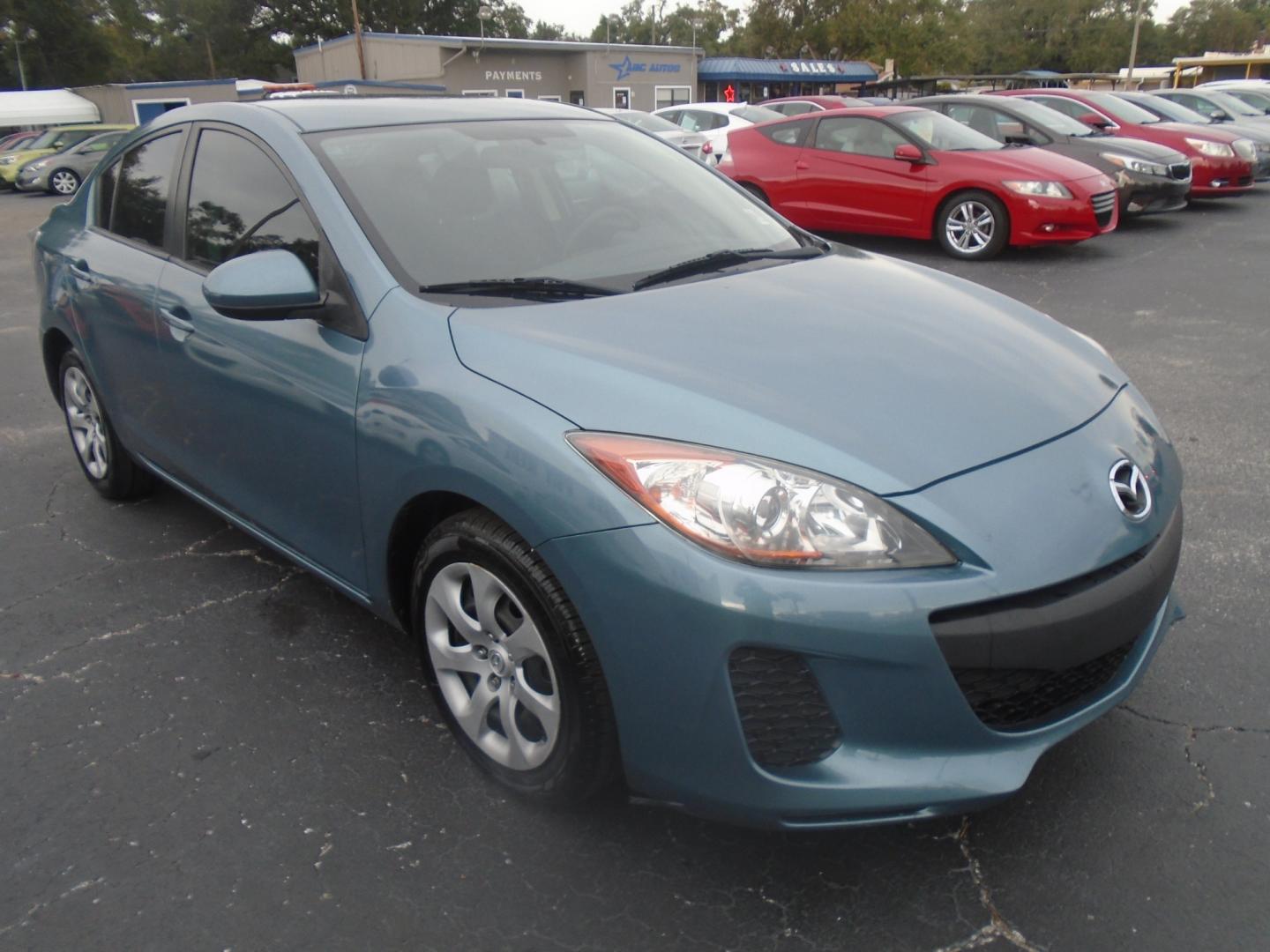 2012 Mazda MAZDA3 (JM1BL1UF0C1) , located at 6112 N Florida Avenue, Tampa, FL, 33604, (888) 521-5131, 27.954929, -82.459534 - Photo#2